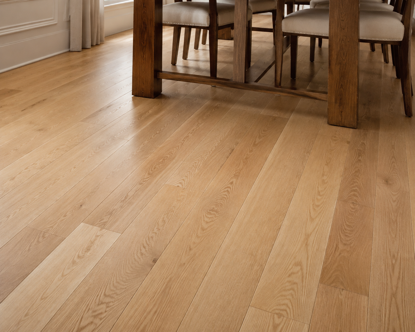 Natural oak hardwood floor beneath a dining table