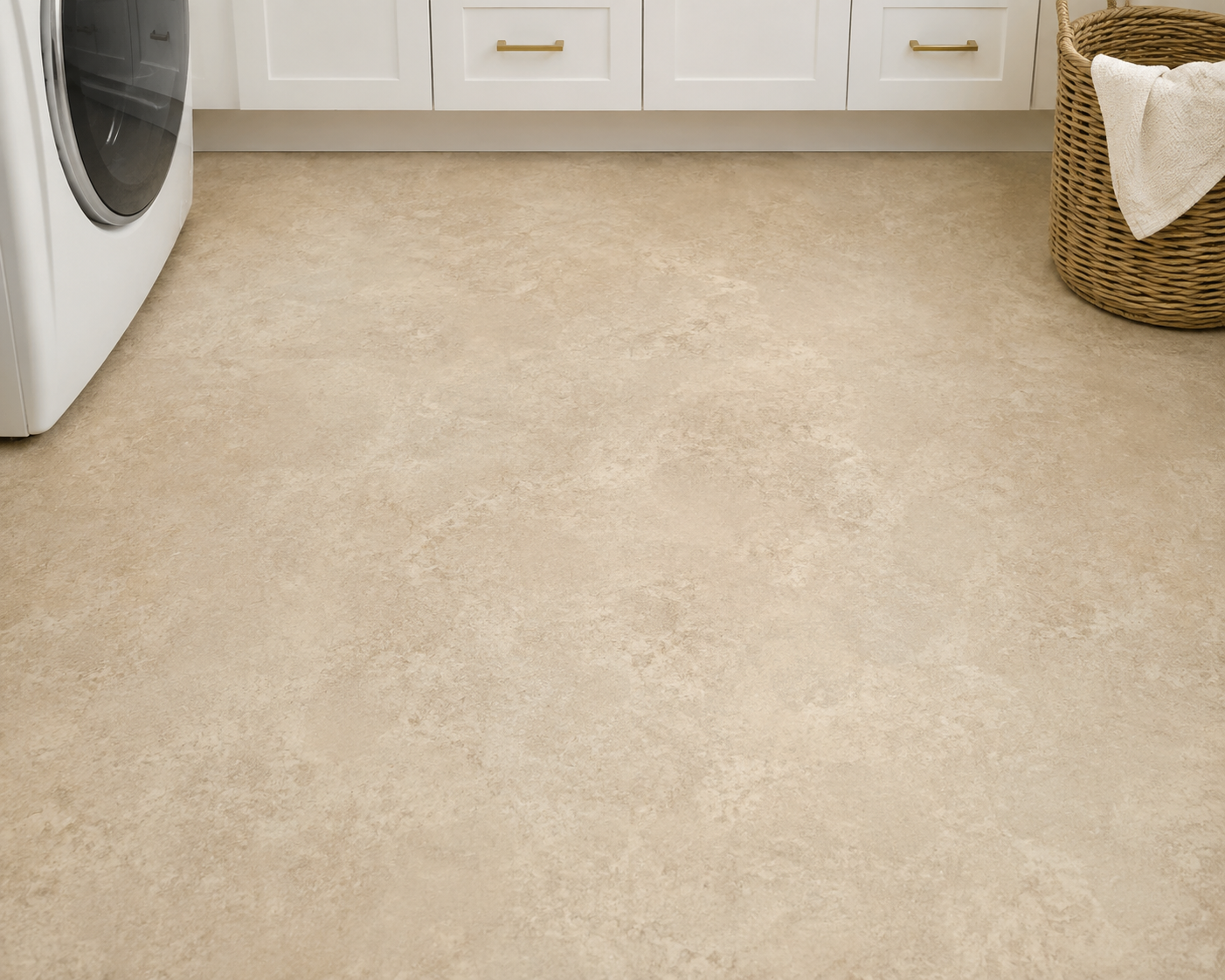 Stone-look sheet vinyl flooring in a finished laundry room